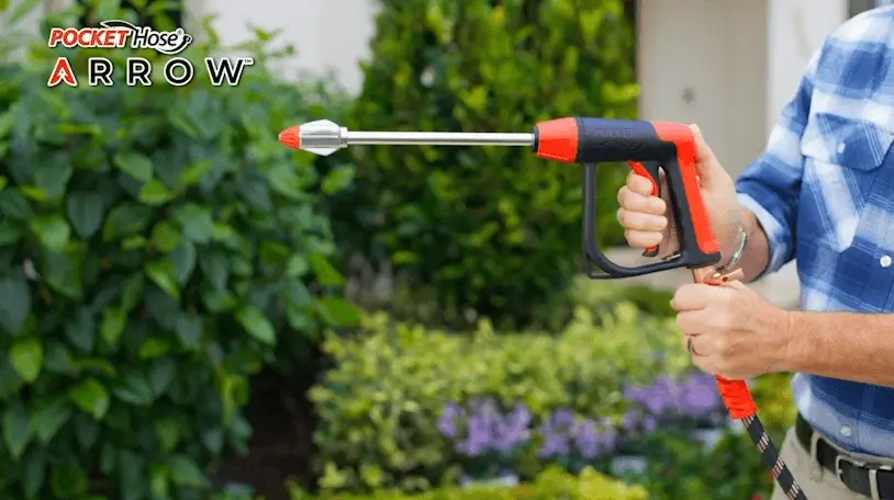 Pocket Hose Arrow Sprayer attached to a garden hose